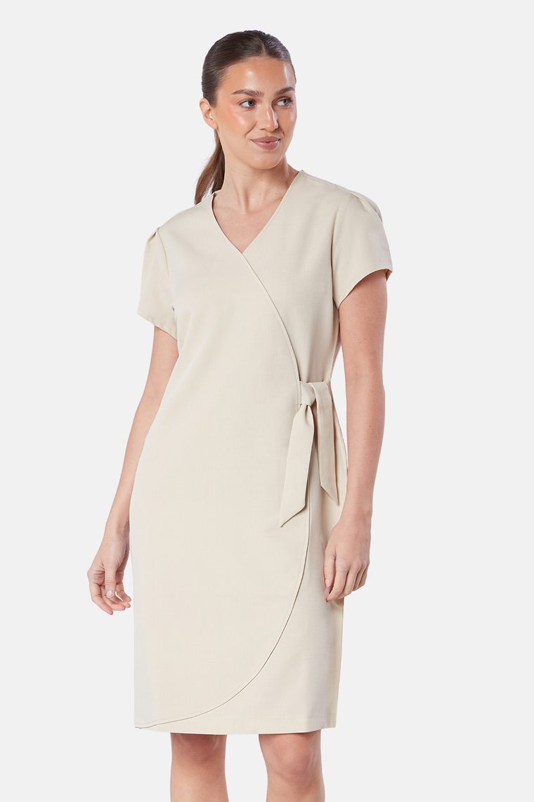 Woman wearing the Modern Front of House Wrap Dress