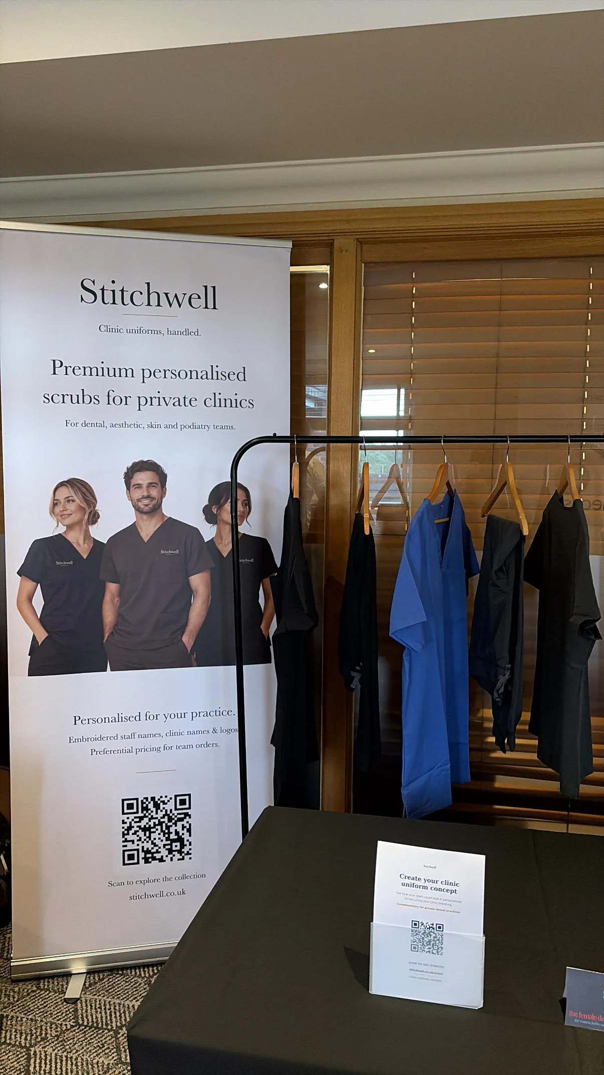 Stitchwell personalised scrub display and roll-up banner at Force is Female North in Knutsford